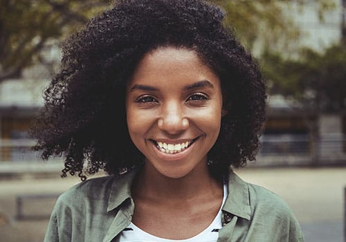 woman outside happy