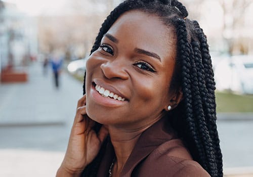 woman outside smiling