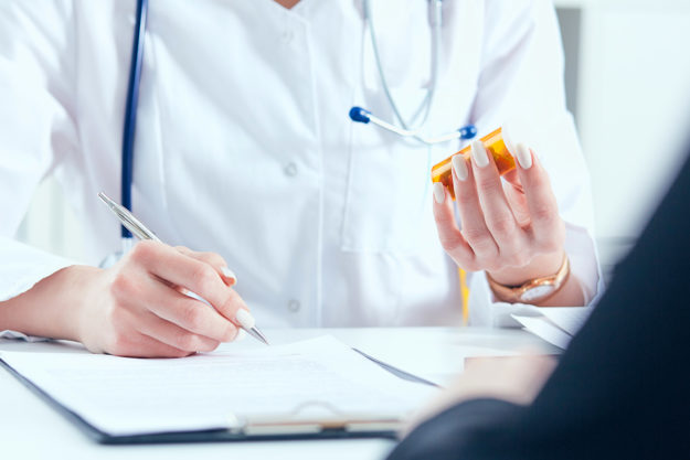 medication assisted treatment for heroin addiction (1) doctor explaining medication assisted treatment for heroin addiction